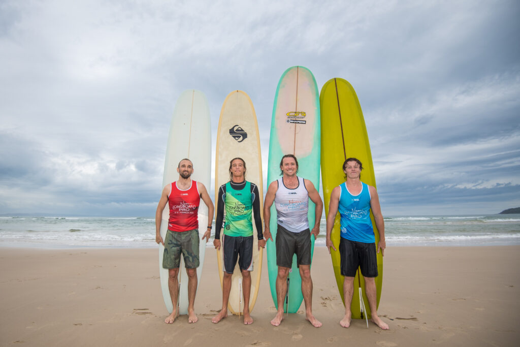 Dallas pictured in Blue rashie of the 2023 WSL longboard event at Noosa
