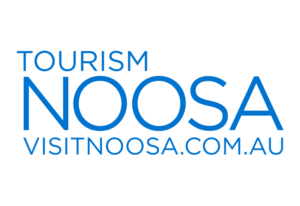 Logo for Tourism Noosa with the words "TOURISM NOOSA VISITNOOSA.COM.AU" in blue capital letters on a light background.